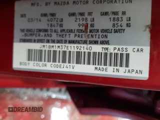2014 Mazda 3 S Grand Touring z VIN JM1BM1M37E1192140, wystawiony jako Copart lot #49821585 z przebiegiem 96 762 mil mil oraz Szkoda całkowita • Salvage title. Historia ofert i sprzedaży dostępna na DreamBid. Obrazek 13.