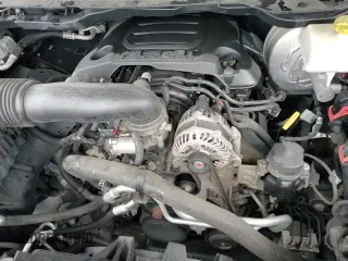 2019 Ram 1500 Rebel z VIN 1C6RRELT7KN724233, wystawiony jako Copart lot #86823514 z przebiegiem 96 464 mil mil oraz Czysty tytuł • Clean title. Historia ofert i sprzedaży dostępna na DreamBid. Obrazek 13.