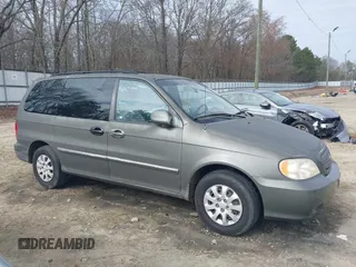 2004 Kia Sedona LX with VIN KNDUP131546543841, listed as a IAAI auction lot 41541012 with 112,122 mi miles. Bid and sale history available at carsss.com. Image 13.