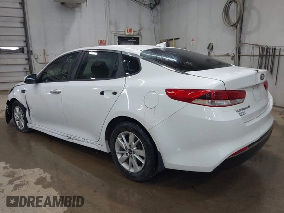 2016 Kia Optima LX with VIN 5XXGT4L39GG048740, listed as a IAAI auction lot 42103300 with 111,574 mi miles and . Bid and sale history available at DreamBid. Image 3.