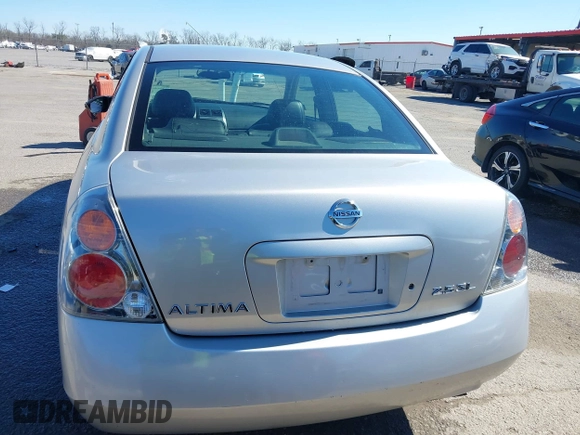 2003 Nissan Altima S with VIN 1N4AL11D63C321486, listed as a IAAI auction lot 41581386 with 200,082 mi miles. Bid and sale history available at carsss.com. Image 16.