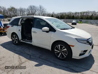 2019 Honda Odyssey Elite with VIN 5FNRL6H94KB067337, listed as a Copart auction lot 52540835 with 69,727 mi miles and Salvage Title. Bid and sale history available at DreamBid. Image 4.