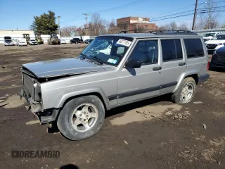 2000 Jeep Cherokee z VIN 1J4FF48S0YL142309, wystawiony jako Copart lot #46277785 z przebiegiem 148 966 mil mil oraz Nie do naprawy. Historia ofert i sprzedaży dostępna na DreamBid. Obrazek 1.
