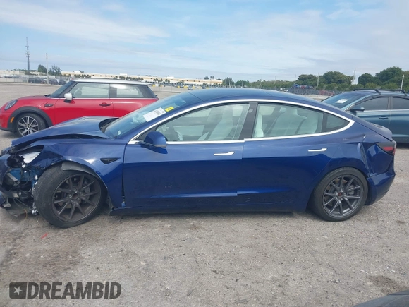 2020 Tesla Model 3 Standard Range Plus with VIN 5YJ3E1EA7LF785838, listed as a IAAI auction lot 41586081 with 38,392 mi miles and . Bid and sale history available at carsss.com. Image 14.