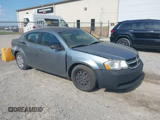 2010 Dodge Avenger SXT with VIN 1B3CC4FB1AN180129, listed as a IAAI auction lot 42150970 with 330,676 mi miles. Bid and sale history available at carsss.com. Image 1.
