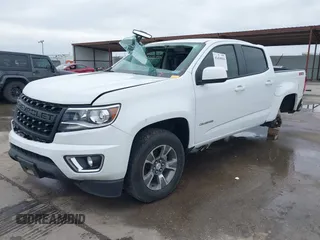 2019 Chevrolet Colorado 4WD Z71 z VIN 1GCGTDEN3K1317883, wystawiony jako IAAI lot #41439010 z przebiegiem 34 306 mil mil oraz . Historia ofert i sprzedaży dostępna na DreamBid. Obrazek 2.