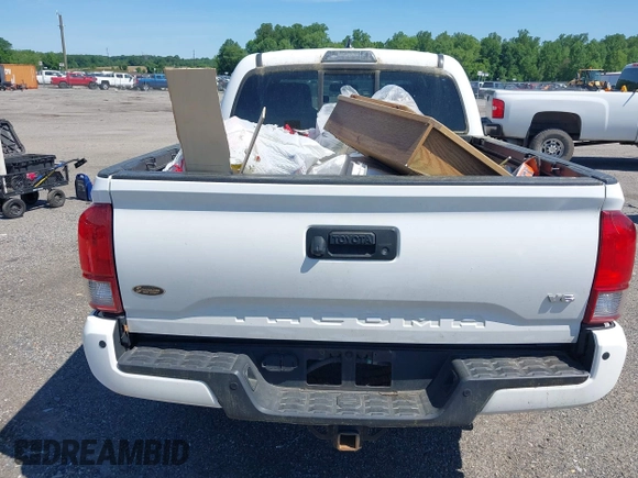 2016 Toyota Tacoma SR with VIN 3TMCZ5AN0GM003224, listed as a IAAI auction lot 42289910 with 140,899 mi miles and . Bid and sale history available at DreamBid. Image 16.