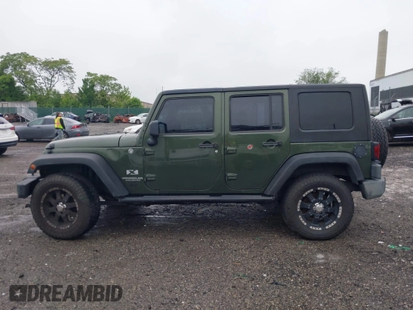 2007 Jeep Wrangler Unlimited X with VIN 1J4GA39127L231378, listed as a IAAI auction lot 42252475 with 152,568 mi miles and . Bid and sale history available at DreamBid. Image 15.