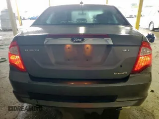 2012 Ford Fusion SEL с VIN 3FAHP0JG9CR263964, выставлен на аукционе Copart как лот 60911215 с пробегом 143 729 миль миль и Списание • Salvage title. История ставок и продаж доступна на DreamBid. Изображение 6.