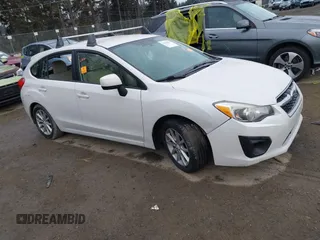 2012 Subaru Impreza Premium z VIN JF1GPAC69CH209314, wystawiony jako IAAI lot #41421465 z przebiegiem 203 998 mil mil oraz . Historia ofert i sprzedaży dostępna na DreamBid. Obrazek 1.