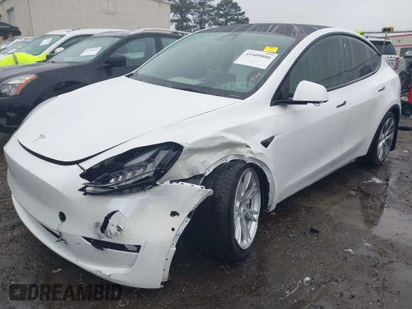 2021 Tesla Model Y Long Range with VIN 5YJYGDEEXMF228914, listed as a IAAI auction lot 41409806 with 48,276 mi miles. Bid and sale history available at carsss.com. Image 19.