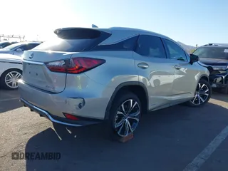 2021 Lexus RX 450h with VIN 2T2HGMDA0MC067228, listed as a IAAI auction lot 41818836 with 28,850 mi miles and . Bid and sale history available at DreamBid. Image 4.