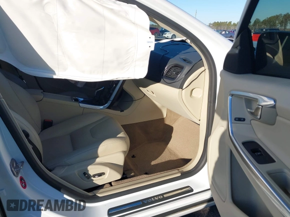 2015 Volvo S60 T5 Drive-E Premier Plus with VIN YV140MFC6F1314534, listed as a IAAI auction lot 41348374 with 81,235 mi miles. Bid and sale history available at carsss.com. Image 5.