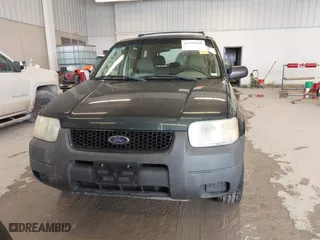 2003 Ford Escape XLS Popular with VIN 1FMYU02143KC35891, listed as a IAAI auction lot 41599760 with 148,381 mi miles. Bid and sale history available at carsss.com. Image 13.
