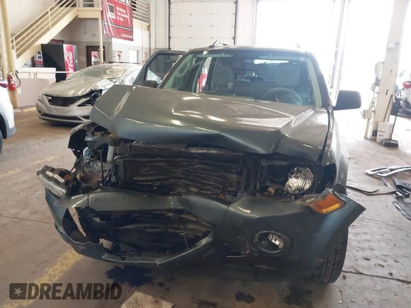 2011 Ford Escape Hybrid with VIN 1FMCU4K31BKC63987, listed as a IAAI auction lot 41987374 with 111,568 mi miles and . Bid and sale history available at DreamBid. Image 13.