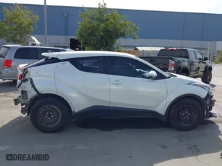 2018 Toyota C-HR XLE with VIN NMTKHMBX4JR049041, listed as a IAAI auction lot 42038397 with 74,930 mi miles. Bid and sale history available at carsss.com. Image 14.