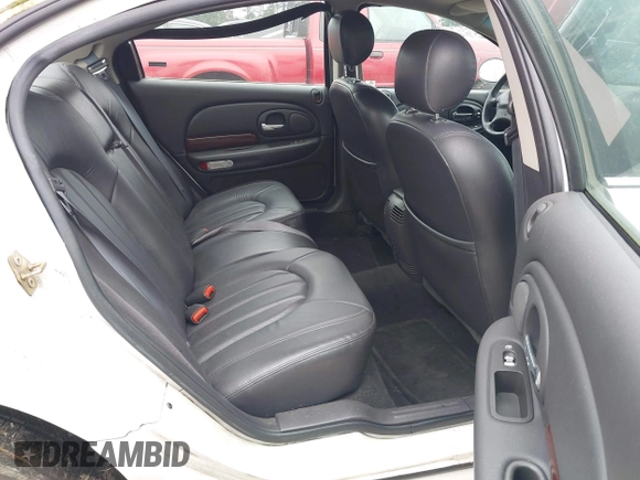 2000 Chrysler LHS with VIN 2C3HC56G4YH382301, listed as a IAAI auction lot 41324699 with 220,076 mi miles and . Bid and sale history available at DreamBid. Image 8.