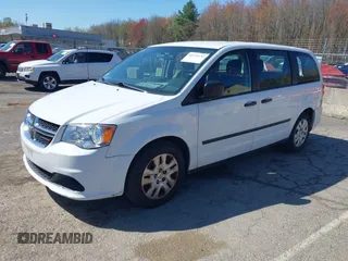 2016 Dodge Grand Caravan SE with VIN 2C4RDGBG9GR401187, listed as a IAAI auction lot 42133432 with 107,742 mi miles and . Bid and sale history available at DreamBid. Image 2.