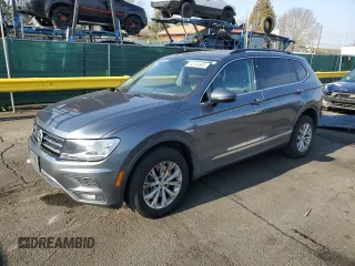 2018 Volkswagen Tiguan SEL with VIN 3VV2B7AX0JM013659, listed as a Copart auction lot 54154665 with 86,603 mi miles and Salvage title. Bid and sale history available at DreamBid. Image 1.