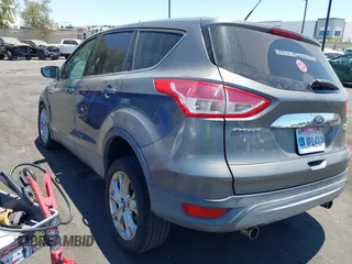 2013 Ford Escape SEL with VIN 1FMCU0H99DUA94443, listed as a IAAI auction lot 42713849 with 84,374 mi miles and . Bid and sale history available at DreamBid. Image 3.