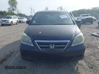 2005 Honda Odyssey EX with VIN 5FNRL38455B135555, listed as a IAAI auction lot 42080079 with 149,468 mi miles and . Bid and sale history available at carsss.com. Image 12.