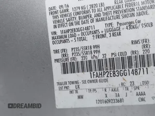 2016 Ford Taurus SEL with VIN 1FAHP2E83GG148711, listed as a IAAI auction lot 41206630 with 115,816 mi miles and . Bid and sale history available at DreamBid. Image 9.