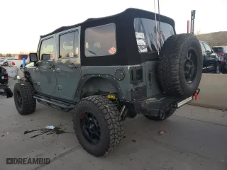 2014 Jeep Wrangler Unlimited Sahara with VIN 1C4BJWEG1EL122709, listed as a Copart auction lot 81367824 with 81,501 mi miles and Salvage Title. Bid and sale history available at carsss.com. Image 2.