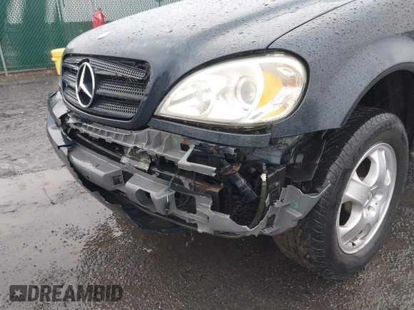 2003 Mercedes-Benz M-Class 3.2L with VIN 4JGAB54EX3A390987, listed as a IAAI auction lot 41482335 with 191,381 mi miles. Bid and sale history available at carsss.com. Image 6.