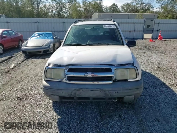 2003 Chevrolet Tracker z VIN 2CNBE13C736912038, wystawiony jako Copart lot #80422844 z przebiegiem 242 512 mil mil oraz Szkoda całkowita • Salvage title. Historia ofert i sprzedaży dostępna na DreamBid. Obrazek 11.
