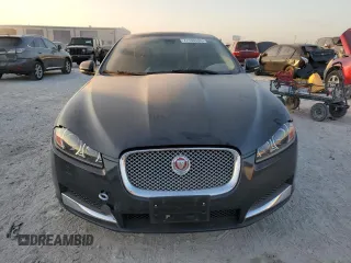 2015 Jaguar XF V6 Portfolio with VIN SAJWA0F76F8U59802, listed as a Copart auction lot 77198104 with 98,859 mi miles and Clean Title. Bid and sale history available at carsss.com. Image 5.
