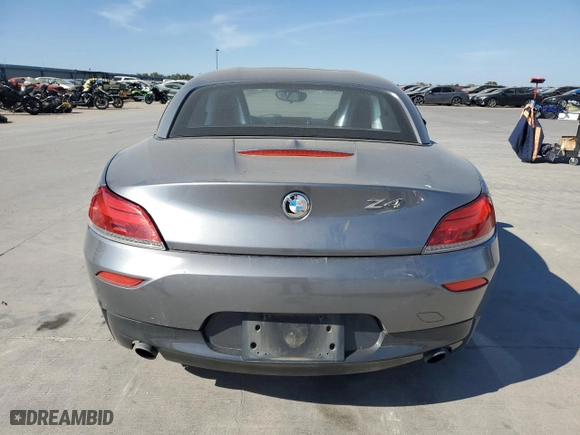 2011 BMW Z4 sDrive35i with VIN WBALM7C59BE384283, listed as a Copart auction lot 77204914 with NaN miles and Salvage Title. Bid and sale history available at carsss.com. Image 6.
