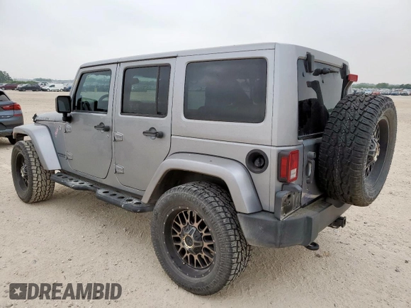 2014 Jeep Wrangler Unlimited Rubicon с VIN 1C4HJWFG3EL322449, выставлен на аукционе Copart как лот 57187665 с пробегом 122 469 миль миль и Списание • Salvage title. История ставок и продаж доступна на DreamBid. Изображение 2.