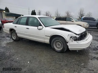 1995 Ford Crown Victoria LX with VIN 2FALP74W1SX200511, listed as a Copart auction lot 48807055 with 62,133 mi miles and Salvage Title. Bid and sale history available at carsss.com. Image 4.