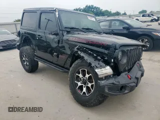 2020 Jeep Wrangler Rubicon with VIN 1C4HJXCG3LW212460, listed as a Copart auction lot 57546715 with 33,085 mi miles and Salvage title. Bid and sale history available at DreamBid. Image 4.