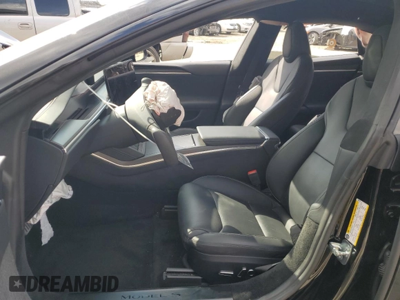 2023 Tesla Model S Plaid z VIN 5YJSA1E63PF498778, wystawiony jako Copart lot #43960765 z przebiegiem Nie podano mil oraz Szkoda całkowita • Salvage title. Historia ofert i sprzedaży dostępna na DreamBid. Obrazek 7.