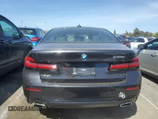 2023 BMW 5 Series 530e with VIN WBA13AG00PCL24045, listed as a Copart auction lot 84961634 with Not provided miles and Salvage title. Bid and sale history available at DreamBid. Image 6.