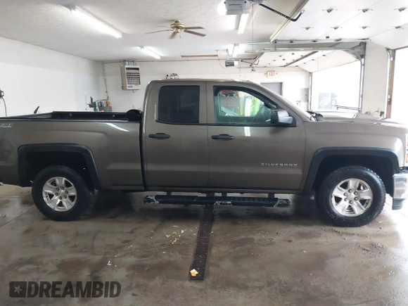 2014 Chevrolet Silverado 1500 LT with VIN 1GCVKREC5EZ147506, listed as a IAAI auction lot 41736960 with 112,399 mi miles and . Bid and sale history available at DreamBid. Image 14.