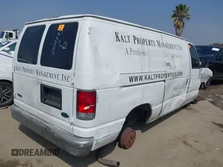 1999 Ford Econoline Cargo with VIN 1FTRE1421XHA35992, listed as a IAAI auction lot 42008448 with 293,689 mi miles and . Bid and sale history available at carsss.com. Image 4.