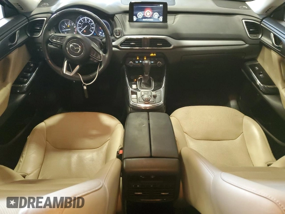 2019 Mazda CX-9 Touring with VIN JM3TCBCY3K0317900, listed as a Copart auction lot 64180945 with 63,721 mi miles and Salvage title. Bid and sale history available at DreamBid. Image 8.
