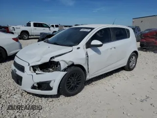 2014 Chevrolet Sonic LT with VIN 1G1JC6SGXE4117408, listed as a Copart auction lot 46913395 with 88,799 mi miles and Salvage Title. Bid and sale history available at carsss.com. Image 1.