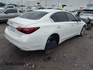 2024 Infiniti Q50 Luxe with VIN JN1EV7BP2RM600585, listed as a IAAI auction lot 41112238 with 5,016 mi miles and . Bid and sale history available at DreamBid. Image 4.