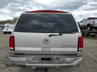 2004 Cadillac Escalade z VIN 1GYEK63N04R309148, wystawiony jako Copart lot #51259085 z przebiegiem 106 646 mil mil oraz Czysty tytuł • Clean title. Historia ofert i sprzedaży dostępna na DreamBid. Obrazek 6.