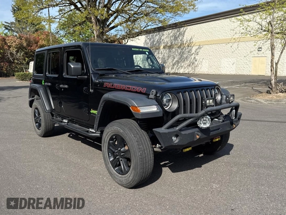 2020 Jeep Wrangler Unlimited Rubicon with VIN 1C4HJXFGXLW234368, listed as a Copart auction lot 54793055 with 56,852 mi miles and Salvage Title. Bid and sale history available at carsss.com. Image 1.