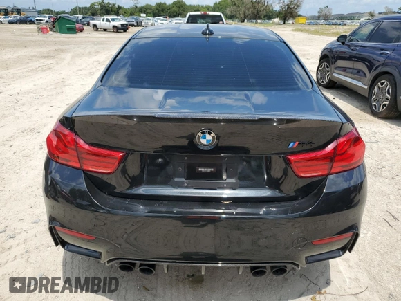 2018 BMW M4 with VIN WBS4Y9C51JAC86230, listed as a Copart auction lot 67757584 with 42,704 mi miles and Salvage Title. Bid and sale history available at carsss.com. Image 6.