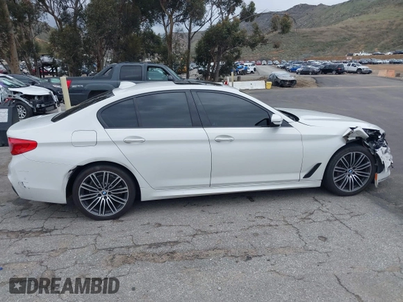 2018 BMW 5 Series 530i z VIN WBAJA5C54JG898565, wystawiony jako IAAI lot #41745230 z przebiegiem 123 776 mil mil oraz . Historia ofert i sprzedaży dostępna na DreamBid. Obrazek 13.