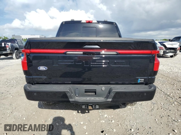 2024 Ford F-150 Lightning Lariat with VIN 1FT6W5L7XRWG09251, listed as a Copart auction lot 59702915 with 6,338 mi miles and Non repairable. Bid and sale history available at DreamBid. Image 6.
