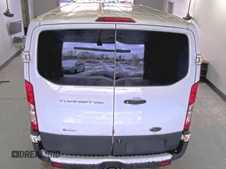 2018 Ford Transit z VIN 1FTYR1YG6JKA87506, wystawiony jako IAAI lot #42501070 z przebiegiem 167 892 mil mil oraz . Historia ofert i sprzedaży dostępna na DreamBid. Obrazek 30.