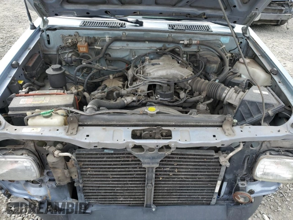 1993 Nissan Frontier SE z VIN 1N6HD16Y0PC408188, wystawiony jako Copart lot #71028394 z przebiegiem 258 939 mil mil oraz Szkoda całkowita • Salvage title. Historia ofert i sprzedaży dostępna na DreamBid. Obrazek 11.
