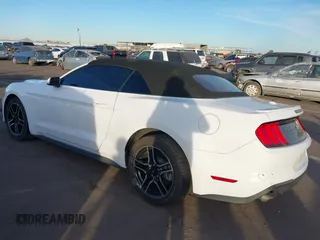 2021 Ford Mustang EcoBoost with VIN 1FATP8UH2M5120338, listed as a IAAI auction lot 40958016 with 76,979 mi miles. Bid and sale history available at carsss.com. Image 3.