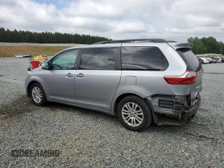 2016 Toyota Sienna XLE with VIN 5TDYK3DC8GS715148, listed as a Copart auction lot 57834045 with 128,769 mi miles and Salvage title. Bid and sale history available at DreamBid. Image 2.